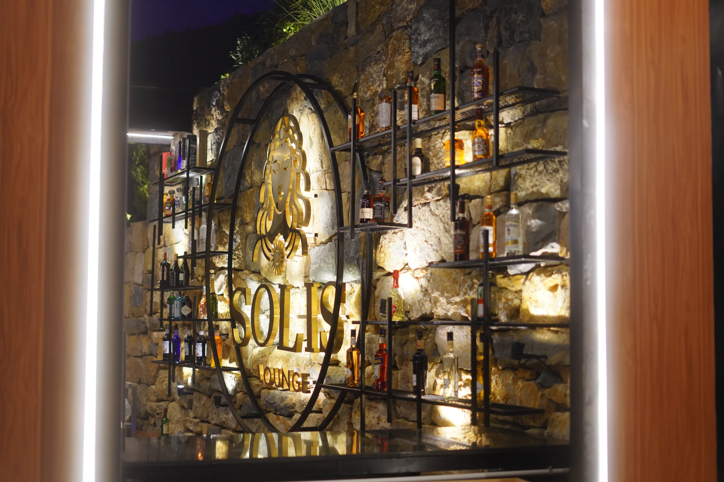 The back bar, under her mark